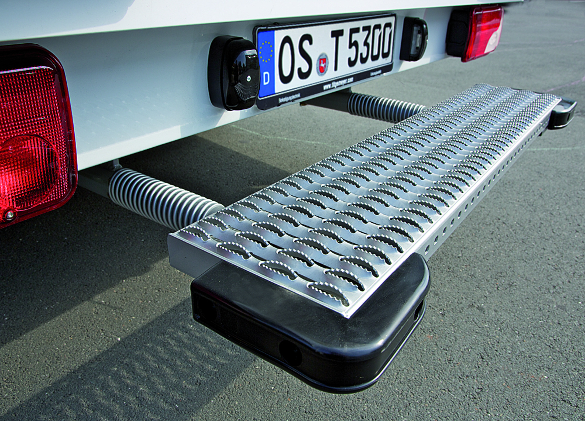 Heck-Trittstufe, federnd gelagert